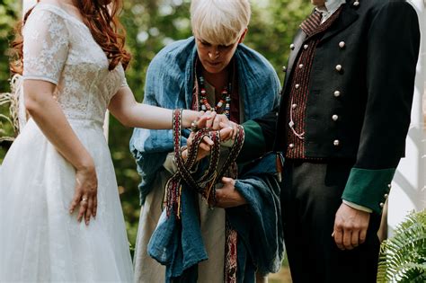 The symbolism of fire and candles in a pagan handfasting ceremony.